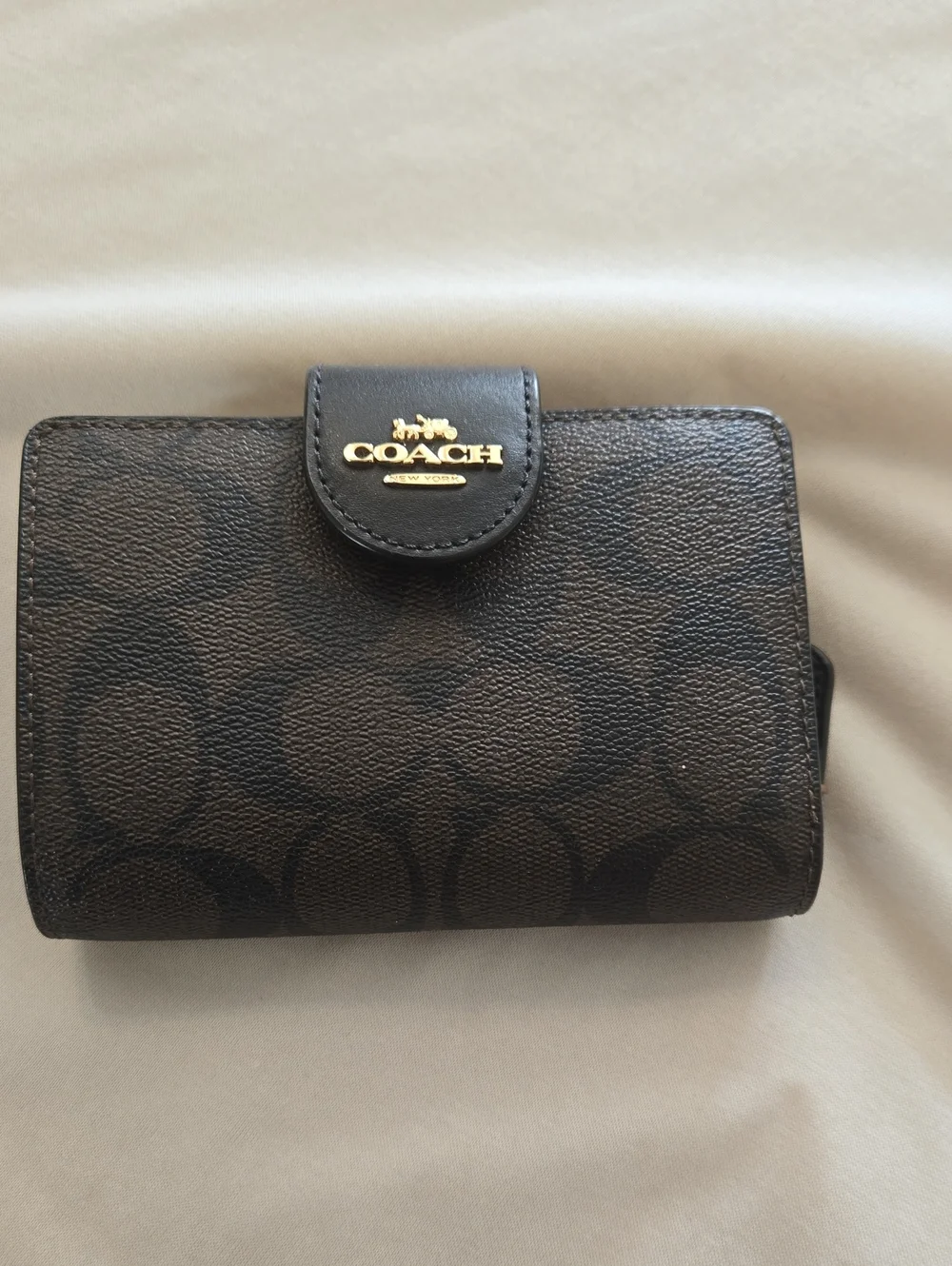 Coach Black Signature Compact Wallet with Gold Logo
